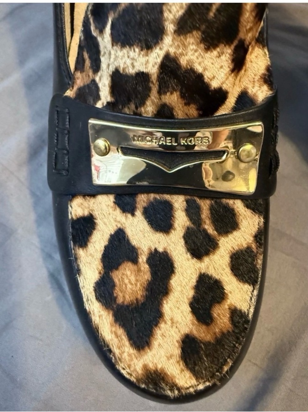 Michael Kors Leopard Print Haircalf Loafer with Black Trim and Gold Plaque